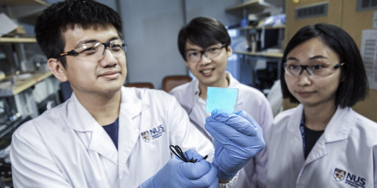 Mr. Wang Guanxiang (left), the leader of the group Assistant Professor Benjamin Tee (center) and Dr. Tan Yu Jun (right). Credits: news.nus.edu.sg